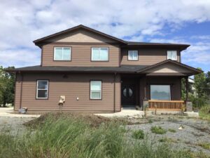 A Residential Chocolate Brown Gutter Installation by Oregon Gutter Service in Albany, Oregon