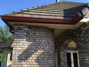 A Residential Colonial Red Gutter Installation by Oregon Gutter Service in Albany, Oregon