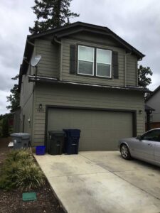 A Residential Forest Green Gutter Installation by Oregon Gutter Service in Albany, Oregon