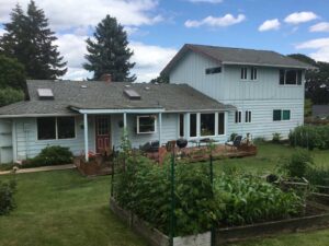 A Residential White Gutter Installation by Oregon Gutter Service in Albany, Oregon