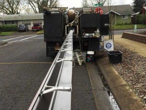 A Residential Chocolate Brown Gutter Installation by Oregon Gutter Service in Corvallis, Oregon