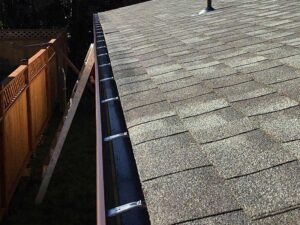 A Residential Chocolate Brown Gutter Installation by Oregon Gutter Service in Corvallis, Oregon