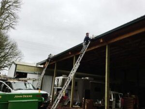 A Residential Forest Green Gutter Installation by Oregon Gutter Service in Corvallis, Oregon