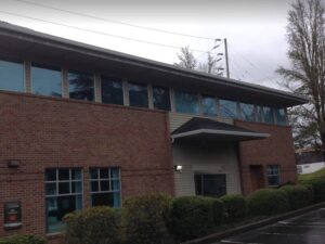 A Commercial White Gutter Installation by Oregon Gutter Service in Eugene, Oregon