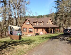 A Residential Chocolate Brown Gutter Installation by Oregon Gutter Service in Eugene, Oregon