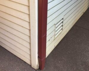 A Residential Colonial Red Gutter Installation by Oregon Gutter Service in Eugene, Oregon