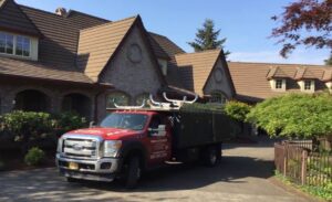 A Residential Colonial Red Gutter Installation by Oregon Gutter Service in Eugene, Oregon