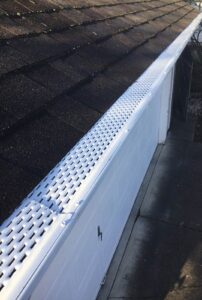 A Residential White Gutter Guard Installation by Oregon Gutter Service in Lebanon, Oregon