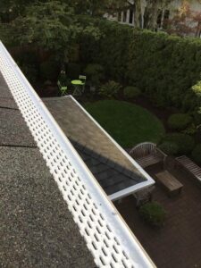 A Residential White Gutter Guard Installation by Oregon Gutter Service in Lebanon, Oregon