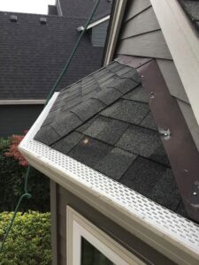 A Residential White Gutter Guard Installation by Oregon Gutter Service in Lebanon, Oregon