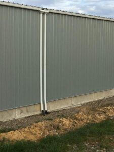 A Outbuilding White Gutter Installation by Oregon Gutter Service in Lebanon, Oregon