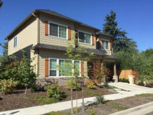 A Residential Cream Gutter Installation by Oregon Gutter Service in Lebanon, Oregon