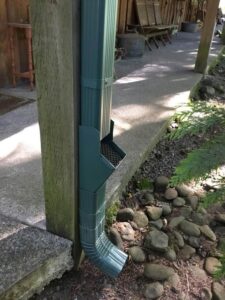 A Residential Forest Green Gutter Installation by Oregon Gutter Service in Lebanon, Oregon