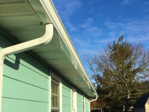 A Residential White Gutter Installation by Oregon Gutter Service in Lebanon, Oregon