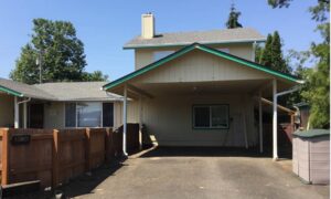 A Residential White Gutter Installation by Oregon Gutter Service in Lebanon, Oregon