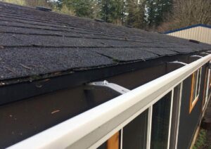 A Residential White Gutter Installation by Oregon Gutter Service in Lebanon, Oregon