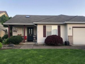 A Residential White Gutter Installation by Oregon Gutter Service in Lebanon, Oregon