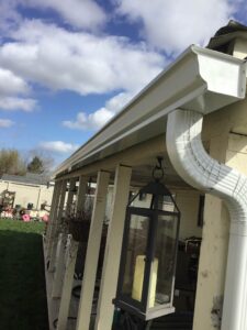 A Residential White Gutter Installation by Oregon Gutter Service in Lebanon, Oregon