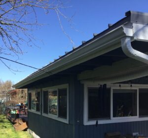 A Residential White Gutter Installation by Oregon Gutter Service in Lebanon, Oregon