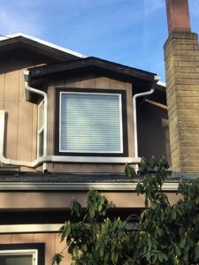 A Residential White Gutter Installation by Oregon Gutter Service in Lebanon, Oregon