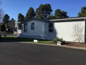 A Residential White Gutter Installation by Oregon Gutter Service in Lebanon, Oregon