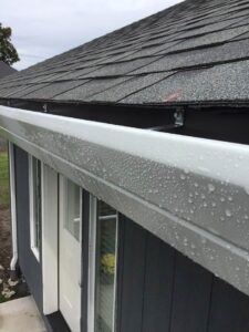 A Residential White Gutter Installation by Oregon Gutter Service in Lebanon, Oregon