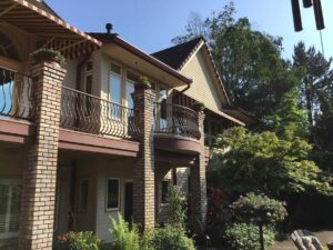 A Residential Colonial Red Gutter Installation by Oregon Gutter Service in Portland, Oregon