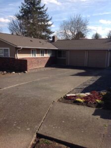 A Residential Pebble Stone Clay Gutter Installation by Oregon Gutter Service in Portland, Oregon