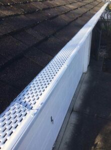 A Residential White Gutter Guard Installation by Oregon Gutter Service in Salem, Oregon