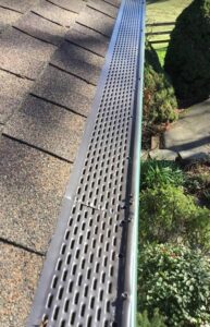 A Farm Forest Green Gutter Guard Installation by Oregon Gutter Service in Salem, Oregon